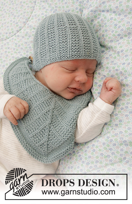 Baby Business Set / DROPS Baby 33-20 - Bonnet et bavoir tricotés pour bébés, en jersey et point mousse, en DROPS BabyMerino. De la taille préma au 4 ans.
