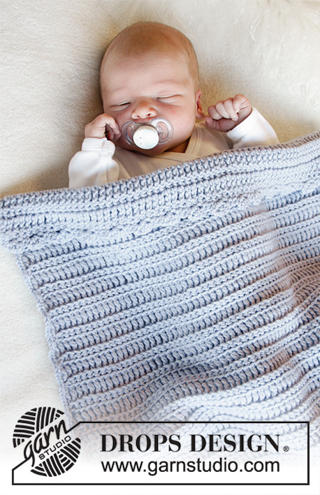 First Year / DROPS Baby 33-37 - Hæklet tæppe til baby med dobbelt-stangmasker og fastmasker. Arbejdet er hæklet i DROPS Merino Extra Fine. Tema Babytæppe
