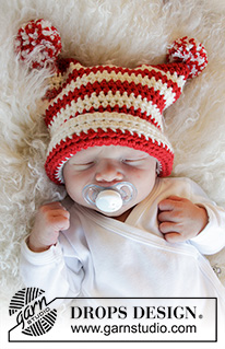 Tiny Elf / DROPS Baby 33-5 - Bonnet bébé crocheté en DROPS Merino Extra Fine, avec rayures et pompons. De la taille prématuré au 4 ans