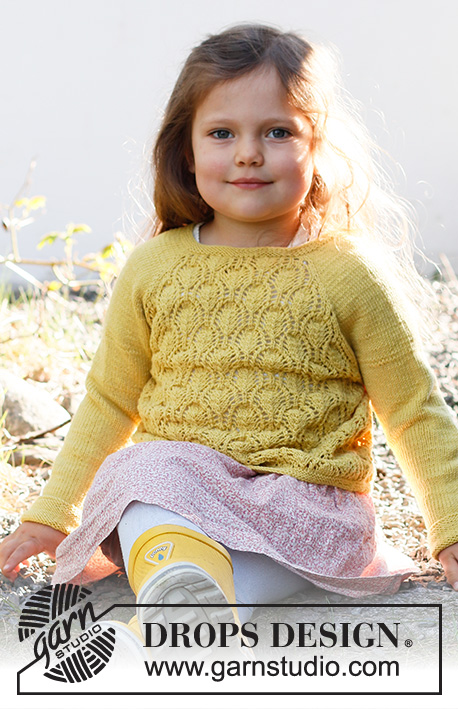 Sweet Marigold Sweater / DROPS Baby & Children 38-12 - Baby a dětský raglánový pulovr s ažurovým vzorem pletený shora dolů z příze DROPS BabyMerino. Velikost 6 měsíců - 8 let.