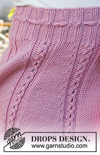 Do the Twist / DROPS Baby & Children 38-14 - Jupe tricotée pour enfant en DROPS Merino Extra Fine. Se tricote de haut en bas avec point ajouré. Du 2 au 12 ans