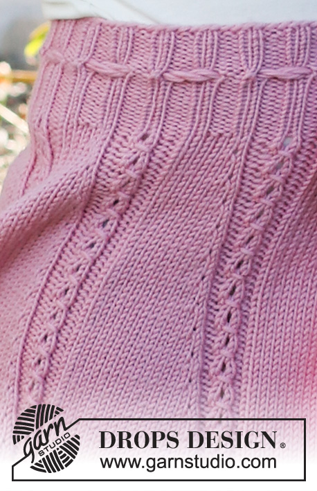 Do the Twist / DROPS Baby & Children 38-14 - Jupe tricotée pour enfant en DROPS Merino Extra Fine. Se tricote de haut en bas avec point ajouré. Du 2 au 12 ans