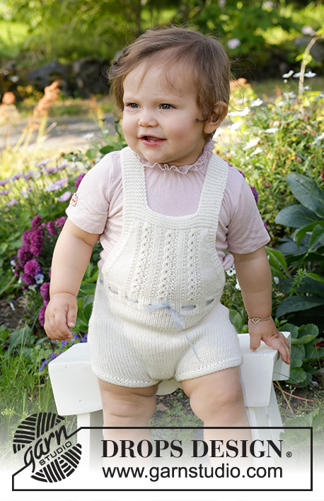 Magic in the Air / DROPS Baby & Children 38-4 - Jardineira curta tricotada para bebé e criança em DROPS BabyMerino, com ponto rendado e ponto jarreteira. Tamanhos : 1 mês - 2 anos