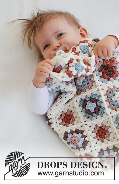 Cuddle Time / DROPS Baby 42-14 - Crocheted baby blanket with Granny-squares in DROPS Merino Extra Fine.