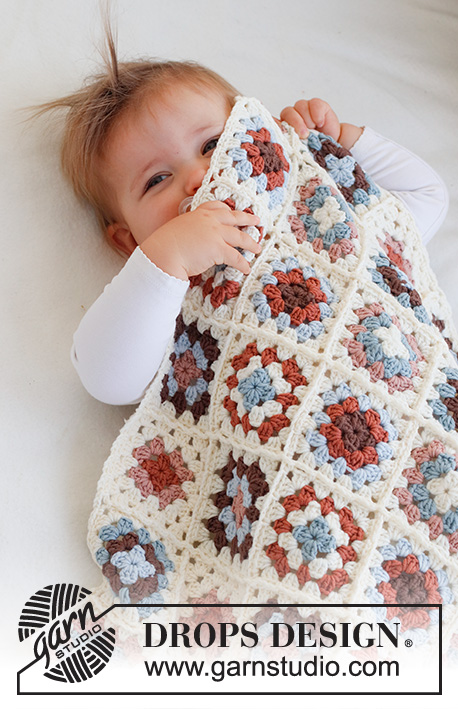Cuddle Time / DROPS Baby 42-14 - Crocheted baby blanket with Granny-squares in DROPS Merino Extra Fine.