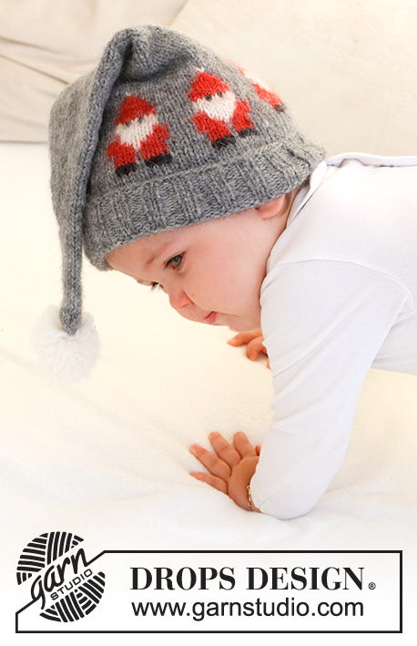 Merry Santas Hat / DROPS Baby 42-22 - Gestrickte Mütze für Babys in DROPS Air. Die Arbeit wird mit Weihnachtsmännern / Wichteln und Pompon gestrickt. Größe 0 - 2 Jahre. Thema: Weihnachten.