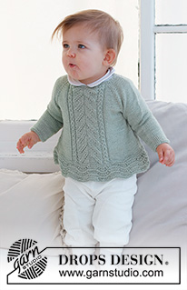 Sweet Ivy / DROPS Baby 42-7 - Dětský a baby raglánový pulovr s vlnkovým a ažurovým vzorem pletený shora dolů z příze DROPS Safran. Velikost 0 - 6 let.
