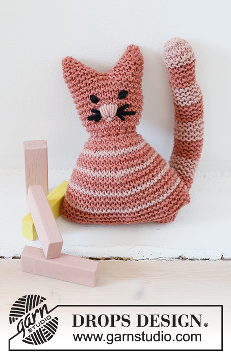 Cleo the Cat / DROPS Baby 43-22 - Zabawka dla dzieci - kot na drutach, z włóczki DROPS Merino Extra Fine. Temat: zabawki.