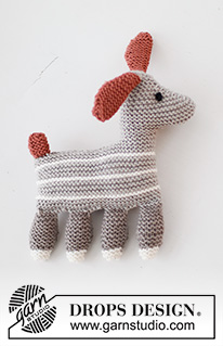 Toby the Dog / DROPS Baby 43-23 - Cão tricotado para bebé em DROPS Merino Extra Fine. Tema: Brinquedos.