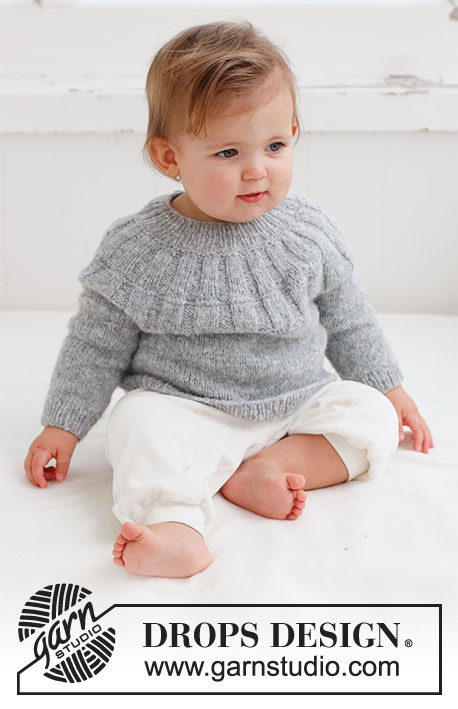 Sweet Gleam / DROPS Baby 43-5 - Strikket genser til baby i DROPS Sky. Arbeidet strikkes ovenfra og ned med rundfelling og vrangbord på bærestykket. Størrelse Prematur til 2 år.