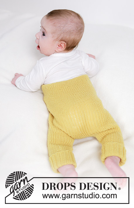 Ready to Stroll / DROPS Baby 45-6 - Strikket bukse til baby i DROPS BabyMerino. Arbeidet strikkes ovenfra og ned i vrangbord. Størrelse 0 til 4 år.
