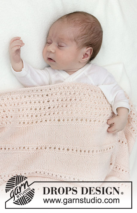Dream Sand Blanket / DROPS Baby 46-12 - Strikket babytæppe i DROPS BabyMerino. Arbejdet strikkes med hulmønster og retstrik.