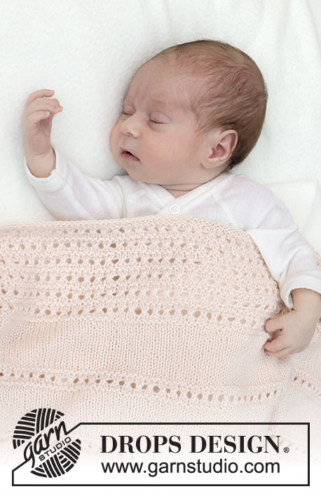 Dream Sand Blanket / DROPS Baby 46-12 - Gestrickte Decke für Babys / Babydecke in DROPS BabyMerino. Die Arbeit wird mit Lochmuster und Krausrippen gestrickt.