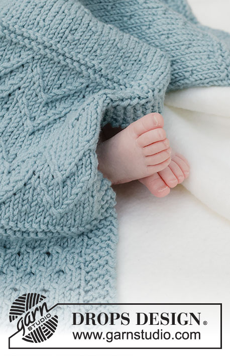 Dot Dot Line Blanket / DROPS Baby 46-3 - Vauvan neulottu peitto DROPS Merino Extra Fine -langasta. Työ neulotaan tasona ja työssä on kohoneuletta.