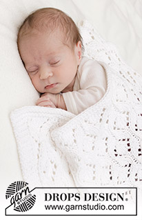 Bright Cuddles Blanket / DROPS Baby 46-4 - Gestrickte Babydecke / Decke für Babys in DROPS Big Merino. Die Arbeit wird mit Lochmuster gestrickt.
