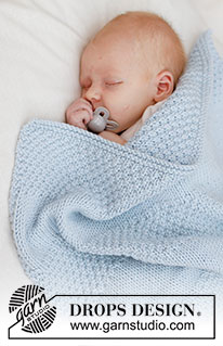 Treasured Pearl Blanket / DROPS Baby 46-5 - Gestrickte Decke für Babys / Babydecke in DROPS Big Merino. Die Arbeit wird in Hin- und Rück-Reihen glatt rechts mit Perlmuster und Streifen gestrickt.