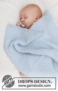 Treasured Pearl Blanket / DROPS Baby 46-5 - Strikket babytæppe i DROPS Big Merino. Arbejdet strikkes frem og tilbage med glatstrik og perlestrik i striber.