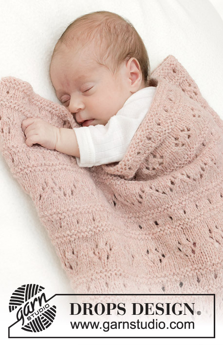 Pink Sea Blanket / DROPS Baby 46-9 - Neulottu vauvanpeitto DROPS Sky-langasta. Työssä on pitsineuletta ja ainaoikeinneuletta.