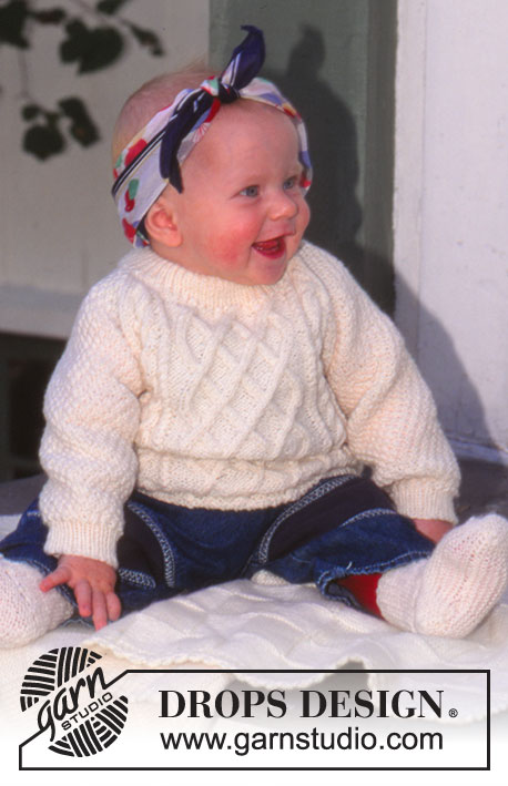 Little Pernille / DROPS Baby 6-2 - Pull tricoté avec torsades en DROPS Karisma.  Du 0 au 6 ans.
