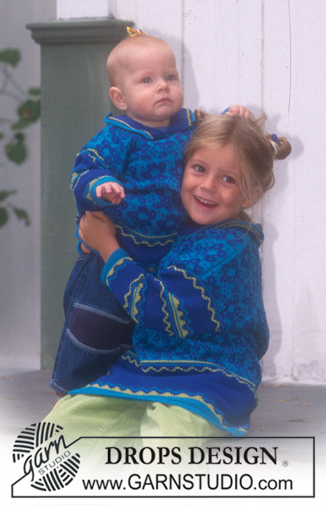 DROPS Baby 6-7 - Strikket genser til baby og barn i DROPS Safran. Arbeidet strikkes med nordisk blomstermønster. Størrelse 0 - 6 år.