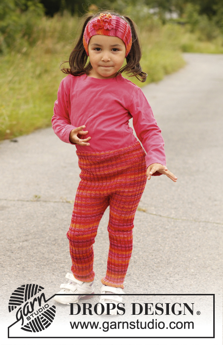 Lyrah / DROPS Children 22-10 - Strikket tunika i DROPS Merino Extra Fine med lommer og bærestykke i perlestrik. Til børn str 3 til 12 år