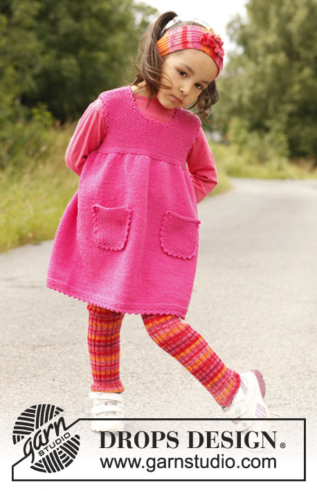 Lyrah / DROPS Children 22-10 - Šaty - tunika s kapsami a sedlem s hráškovým vzorem pletená z příze DROPS Merino Extra Fine. Velikosti pro děti od 3 do 12 let.