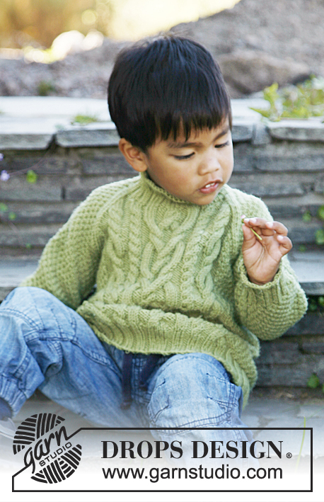 Igor / DROPS Children 22-43 - Raglánový pulovr s copánkovým a hráškovým vzorem pletený z příze DROPS Merino Extra Fine. Velikosti pro děti od 3 do 12 let.  