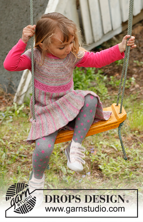 Twirly Girlie / DROPS Children 23-2 - Lapsen poikittain neulottu mekko DROPS Fabel-langasta. Työssä on kaarroke, ainaoikeinneulottu hame ja lyhennettyjä kerroksia. Koot 3-12 vuotta.