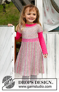Twirly Girlie / DROPS Children 23-2 - Robe tricotée en DROPS Fabel, avec empiècement rond et jupe tricotée au point mousse dans le sens de la longueur avec rangs raccourcis. Taille enfant du 3 au 12 ans.