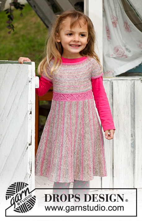 Twirly Girlie / DROPS Children 23-2 - Lapsen poikittain neulottu mekko DROPS Fabel-langasta. Työssä on kaarroke, ainaoikeinneulottu hame ja lyhennettyjä kerroksia. Koot 3-12 vuotta.