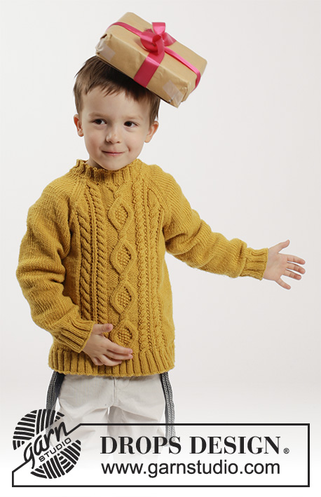 Lucky Jack / DROPS Children 26-3 - Sweterek na drutach, z reglanem i warkoczami, z włóczki DROPS Merino Extra Fine. Od 2 do 10 lat