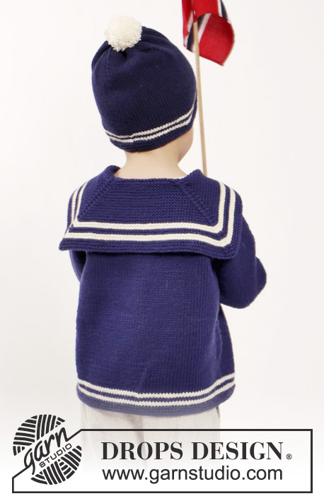 Sailor Aksel / DROPS Children 26-7 - Strikket jakke med raglan, løs matroskrage med sløyfe, strømper og lue med pongpong i DROPS Merino Extra Fine. Til barn i størrelse 2 - 10 år