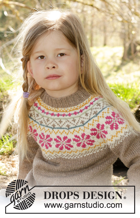 Prairie Fairy Jumper / DROPS Children 27-8 - Sweterek na drutach z zaokrąglonym karczkiem i żakardem norweskim, z włóczki DROPS Lima. Od 3 do 12 lat.