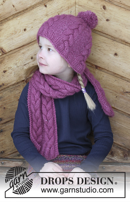 Berry Wrap / DROPS Children 30-16 - L'ensemble se compose de: bonnet et écharpe au tricoté pour enfant, avec torsades . Du 2 au 10 ans L’ensemble se tricote en DROPS Air.