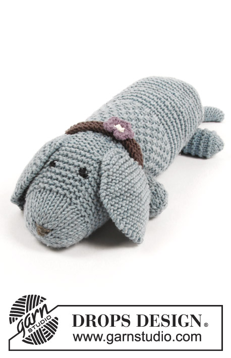 Allie Woof the Dog / DROPS Children 30-24 - Knitted toy dog in garter stitch and moss stitch, with collar. The piece is worked in DROPS Big Merino.