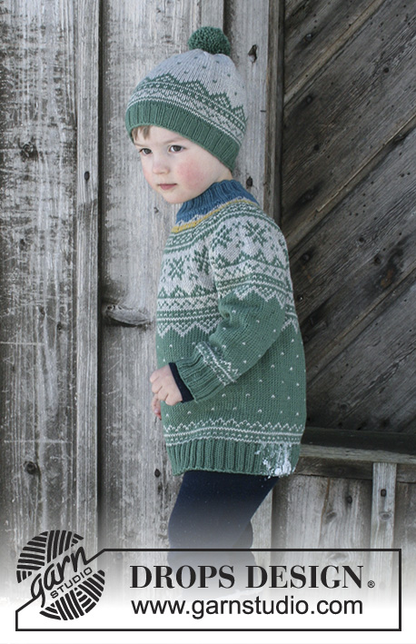 Seiland Jumper / DROPS Children 30-5 - Set consists of: Jumper for kids with round yoke and multi-coloured Norwegian pattern, worked top down. Hat with multi-coloured Norwegian pattern and pompom. Size 2 - 12 years Set is knitted in DROPS Merino Extra Fine.