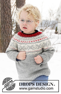 Narvik / DROPS Children 32-12 - Strikket bluse til barn i DROPS Karisma. Arbejdet er strikket oppefra og ned med rundt bærestykke og nordisk mønster på bærestykket. Størrelse 2 – 12 år