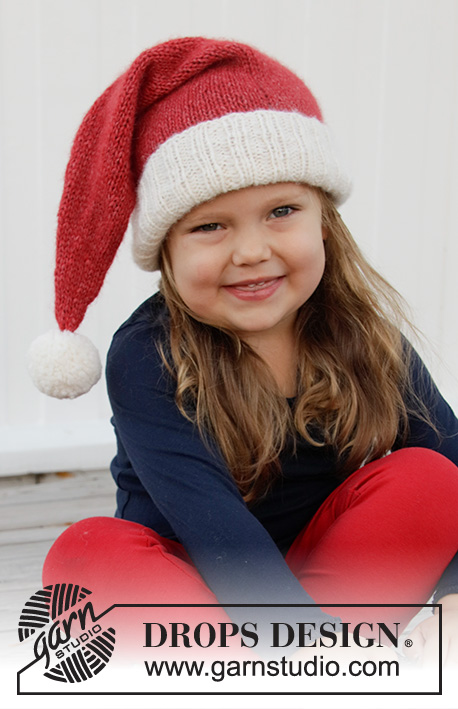Sleepy Santa Hat / DROPS Children 32-21 - Cappello di Babbo Natale per bambini in DROPS Air. Lavorato a maglia rasata e coste. Taglie 3 – 12 anni. Tema: Natale.