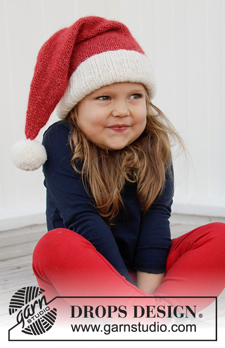 Sleepy Santa Hat / DROPS Children 32-21 - Gebreide kerstmuts voor kinderen in DROPS Air. Het werk wordt gebreid in tricotsteek en boordsteek. Maten 3 – 12 jaar. Thema: Kerst.