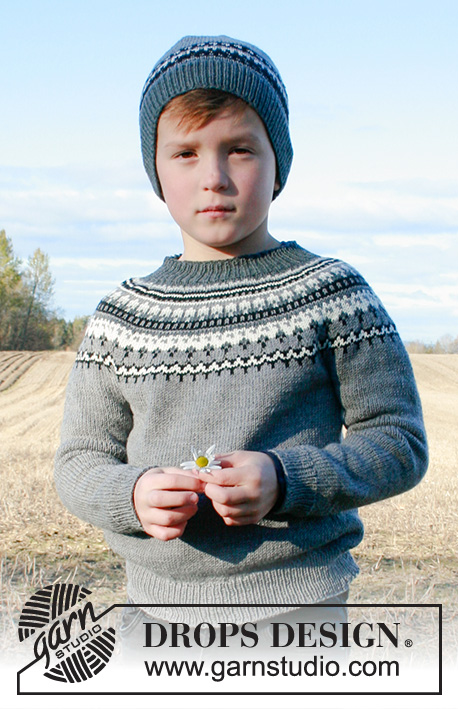 Dalvik / DROPS Children 34-18 - Dětský pulovr s kruhovým sedlem a norským vzorem pletený shora dolů z příze DROPS BabyMerino. Velikost 2-12 let.
Dětská čepice s norským vzorem pletená z příze DROPS BabyMerino.