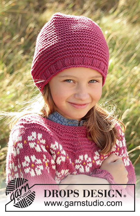 Daisy Delight Hat / DROPS Children 34-6 - Knitted hat for children in DROPS Merino Extra Fine or DROPS Lima. The piece is worked in the round, bottom up with garter stitch and stockinette stitch. Sizes 3-12 years.