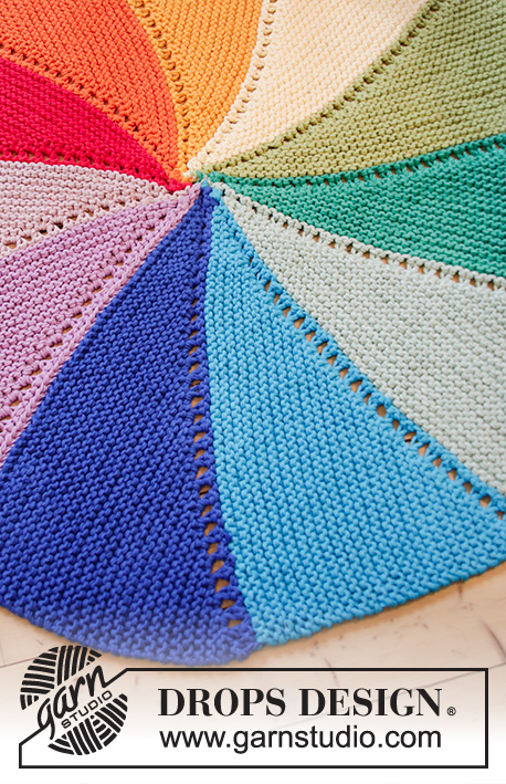 Colour Wheel Carpet / DROPS Children 35-5 - Tapis tricoté avec 3 fils DROPS Paris, avec rayures, point mousse et rangs raccourcis.