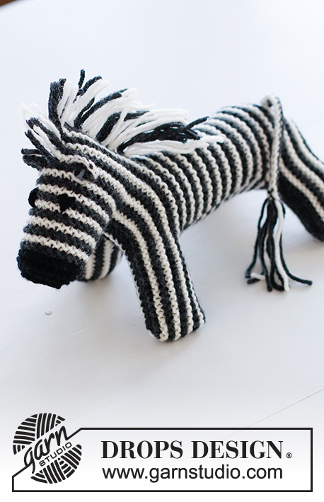 Oreo the Zebra / DROPS Children 37-19 - Cebra de punto en punto musgo y franjas en DROPS Merino Extra Fine.
