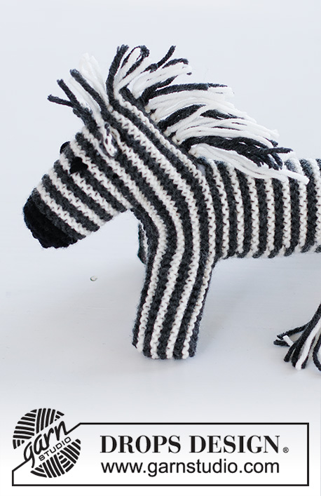 Oreo the Zebra / DROPS Children 37-19 - Cebra de punto en punto musgo y franjas en DROPS Merino Extra Fine.
