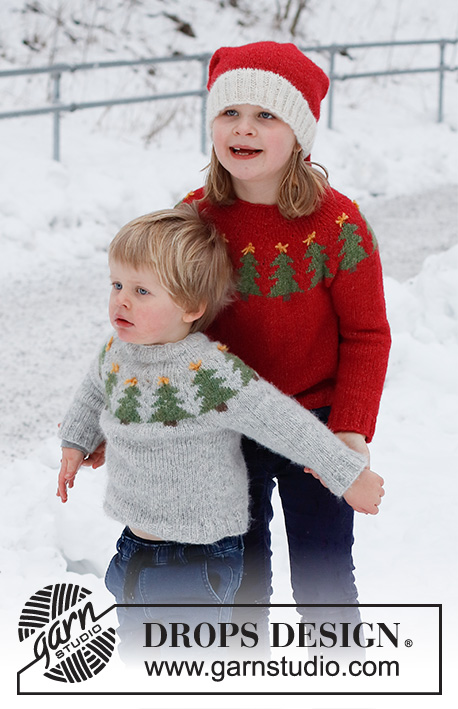 Merry Trees / DROPS Children 41-17 - Maglione e cappello natalizi per bambini lavorati ai ferri in DROPS Air. Il maglione è lavorato dall'alto in basso, con sprone rotondo e motivo con alberi di Natale. Il cappello è lavorato in tondo, dal basso verso l’alto. Taglie: 2 – 14 anni. Tema: Natale.