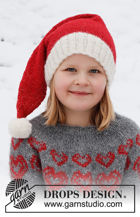 Merry Hearts Hat / DROPS Children 41-19 - Dětská špičatá čepice pletená v kruhových řadách zdola nahoru z příze DROPS Air. Velikost 2 – 14 let. Motiv: Vánoce.