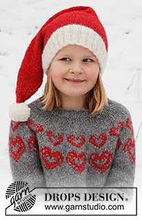 Merry Hearts / DROPS Children 41-3 - Kötött pulóver és sapka gyerekeknek, DROPS Air fonalból. A pulóvert fentről lefelé irányban készítjük, kerek vállrésszel, és szívecskés mintával. A sapkát körben, az aljától felfelé haladva kötjük. 2 - 14 éveseknek való méretekben Téma: Karácsony