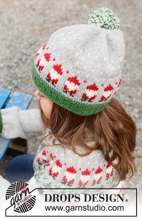 Santa Time Hat / DROPS Children 44-15 - Cappello per bambini lavorato ai ferri in DROPS Karisma. Lavorato dal basso verso l’alto, con motivo colorato di Babbo Natale. Taglie: 2 – 14 anni. Tema: Natale.