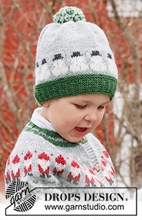 Snowman Time Hat / DROPS Children 44-18 - Dziecięca czapka na drutach, z włóczki DROPS Karisma. Przerabiana od dołu do góry, z żakardem w bałwanki. Od 2 do 14 lat. Temat: Boże Narodzenie.