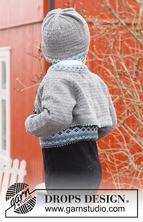 Hipp Hipp Hurra Jacket / DROPS Children 44-3 - Dziecięcy krótki rozpinany sweter na drutach, przerabiany od góry do dołu z włóczki DROPS Baby Merino. Z żakardem norweskim i reglanowymi rękawami. Od 6 miesięcy do 6 lat.